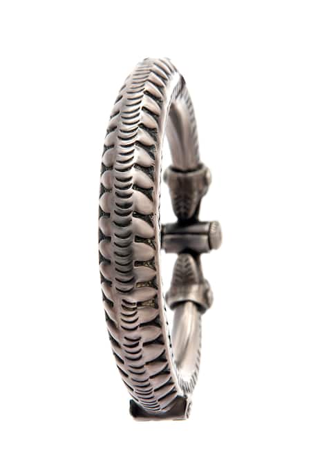 Neeta Boochra Silver Plated Serpentine Charm Engraved Tribal Bangle at Aza Fashions Neeta Boochra_Silver Plated Serpentine Charm Engraved Tribal Bangle _at_Aza_Fashions