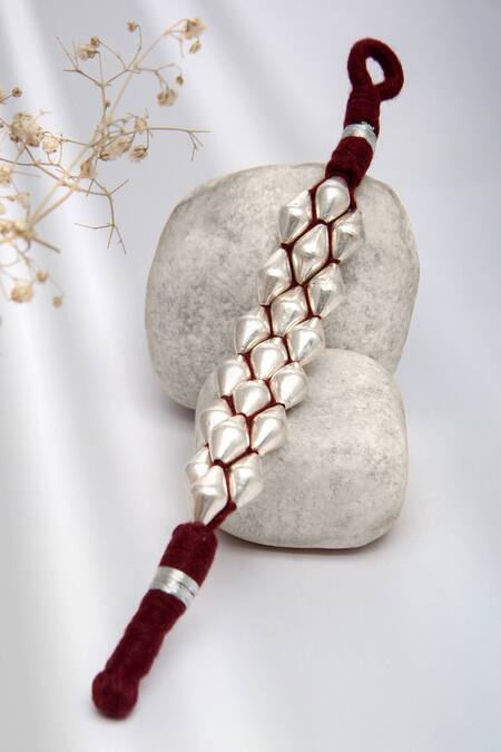 Neeta Boochra Silver Plated Beads Sonic Melody Dholki Bracelet at Aza Fashions Neeta Boochra_Silver Plated Beads Sonic Melody Dholki Bracelet_at_Aza_Fashions