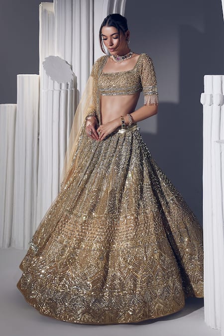 Buy_Ruchika Hurria_Gold Silk, Net, Cotton Sequins, Stones, Smocking Crystal Embroidered Lehenga Set _Online_at_Aza_Fashions