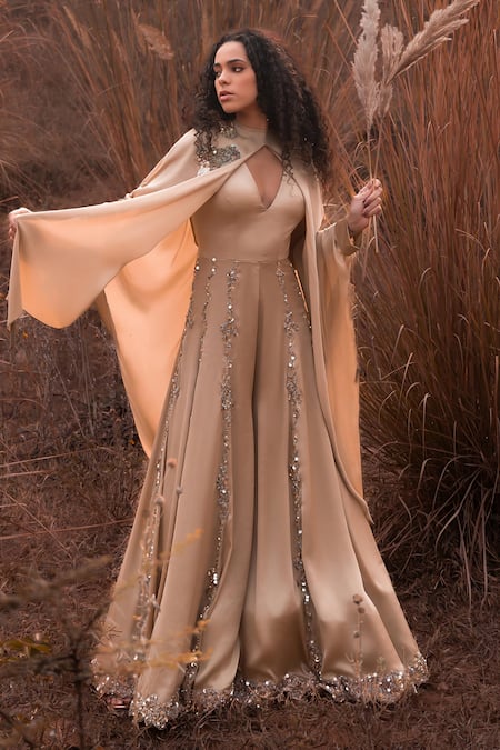 Kaprapan By Anaita Shah_Beige Satin Chiffon Embroidered Sequin Round Jumpsuit With Cape_Online_at_Aza_Fashions