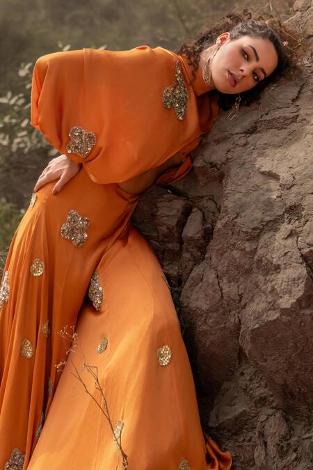 Kaprapan By Anaita Shah_Orange Satin Chiffon Embroidered Sequin High Neck Cutout Jumpsuit_at_Aza_Fashions