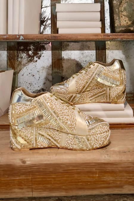 Shop Tiesta Gold Cut Work, Pearls, Sequins Poppy Embroidered Bridal Sneaker Platform Wedges at Aza Fashions Shop_Tiesta_Gold Cut Work, Pearls, Sequins Poppy Embroidered Bridal Sneaker Platform Wedges _at_Aza_Fashions