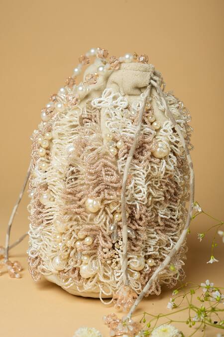 ClutcH'D_Cream Embroidery, Beads, Bows Hand Potli Bag _Online_at_Aza_Fashions