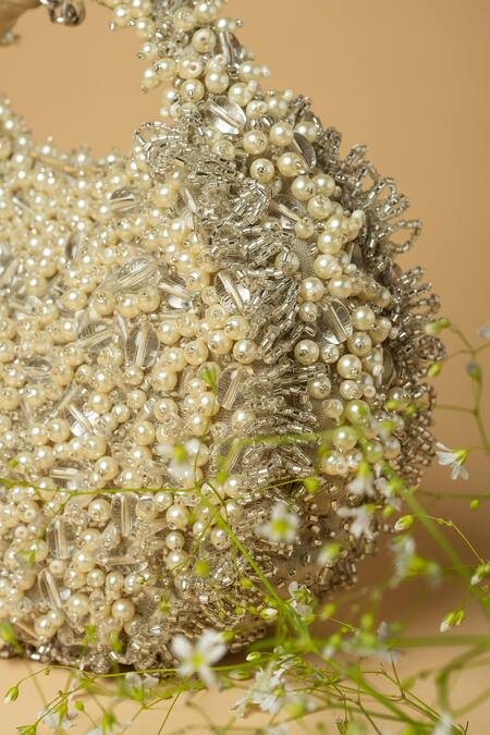 ClutcH'D_White Crystals, Bows, Beads Raw Silk Embellished Bag _Online_at_Aza_Fashions