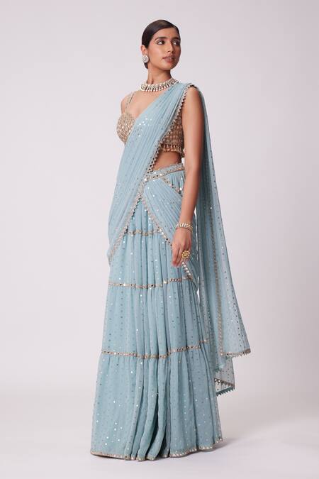 Vvani By Vani Vats Blue Georgette Beads, Sequins, Quad Embroidered Tiered Lehenga Saree With Blouse Online at Aza Fashions Vvani By Vani Vats_Blue Georgette Beads, Sequins, Quad Embroidered Tiered Lehenga Saree With Blouse _Online_at_Aza_Fashions