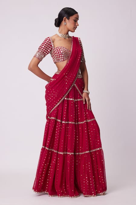 Vvani By Vani Vats Red Georgette Mirrors Tikki Embroidered Tiered Lehenga Saree With Blouse Online at Aza Fashions Vvani By Vani Vats_Red Georgette Mirrors Tikki Embroidered Tiered Lehenga Saree With Blouse _Online_at_Aza_Fashions