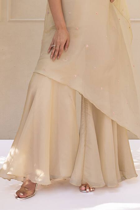 Koashee By Shubitaa Beige Tissue, Silk Sequins, Beads, Asymmetric Kurta With Flared Pant Online at Aza Fashions Koashee By Shubitaa_Beige Tissue, Silk Sequins, Beads, Asymmetric Kurta With Flared Pant _Online_at_Aza_Fashions