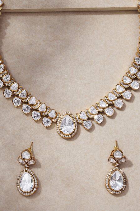 Shop Joules By Radhika Gold Plated Crystals Ethereal Embellished Necklace Set at Aza Fashions Shop_Joules By Radhika_Gold Plated Crystals Ethereal Embellished Necklace Set_at_Aza_Fashions