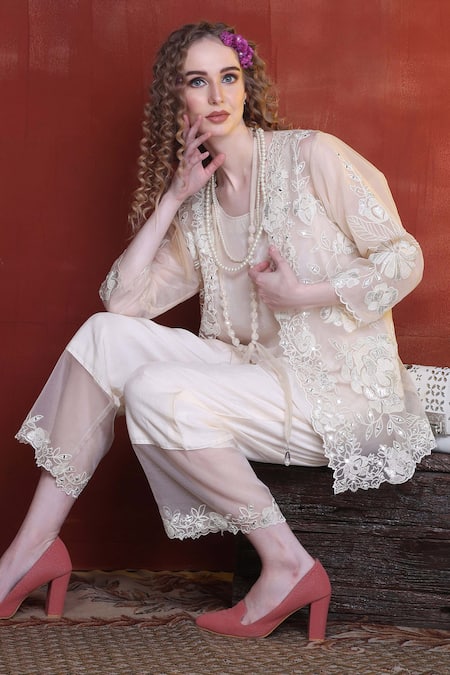 Sunita Nagi Ivory Organza, Silk Mirrors, Embroidery Open Neck Bloom Cutwork Jacket Pant Set Online at Aza Fashions Sunita Nagi_Ivory Organza, Silk Mirrors, Embroidery Open Neck Bloom Cutwork Jacket Pant Set _Online_at_Aza_Fashions