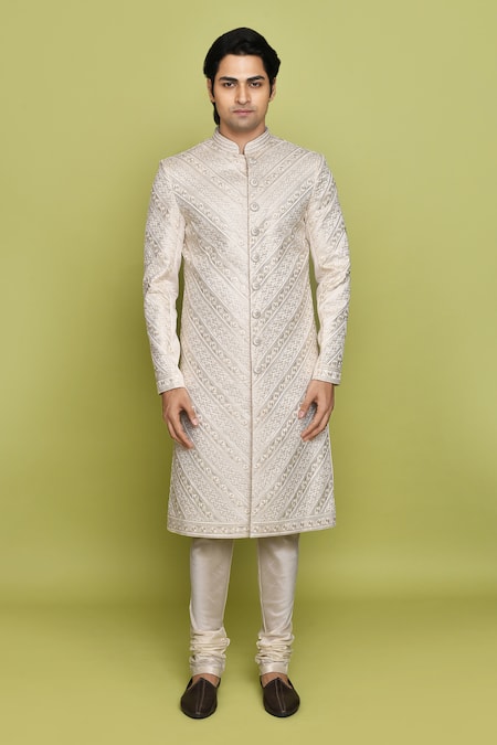 Arihant Rai Sinha_Cream Brocade, Denim Embroidery Thread Sherwani With Churidar _at_Aza_Fashions