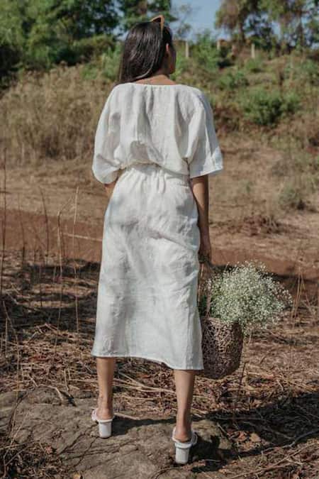 Shop Akashi Clothing White Linen V-neck Handloom Waist Tie-up Dress at Aza Fashions Shop_Akashi Clothing_White Linen V-neck Handloom Waist Tie-up Dress _at_Aza_Fashions