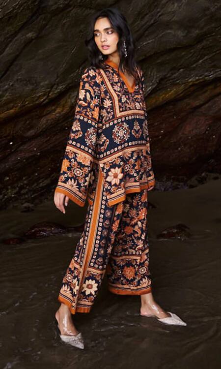 Shop Dash And Dot Black Viscose Embroidery Bandeau Neck Earth Toned Printed Top And Pant Set Online at Aza Fashions Shop_Dash And Dot_Black Viscose Embroidery Bandeau Neck Earth Toned Printed Top And Pant Set _Online_at_Aza_Fashions