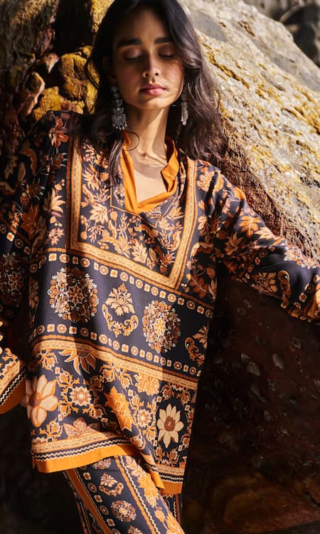 Dash And Dot Black Viscose Embroidery Bandeau Neck Earth Toned Printed Top And Pant Set at Aza Fashions Dash And Dot_Black Viscose Embroidery Bandeau Neck Earth Toned Printed Top And Pant Set _at_Aza_Fashions