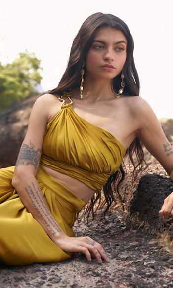 Dash And Dot_Yellow 100% Recycled Polyester Plain Asymmetric One Shoulder Draped Blouse_Online_at_Aza_Fashions