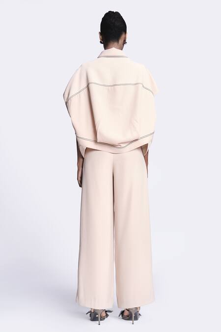 Shop Shahin Mannan Beige Crepe Solid Flared Pant at Aza Fashions Shop_Shahin Mannan_Beige Crepe Solid Flared Pant _at_Aza_Fashions