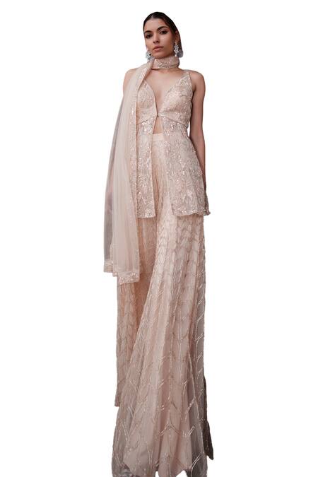 Kashmiraa_Beige Net, Tulle, Cotton Beads, Floral Embroidered Slit Kurta Sharara Set _at_Aza_Fashions