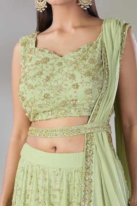 Astha Narang Green Net Cut Work, Sequins Sweetheart Neck Heavy Jaal Lehenga Set Online at Aza Fashions Astha Narang_Green Net Cut Work, Sequins Sweetheart Neck Heavy Jaal Lehenga Set _Online_at_Aza_Fashions