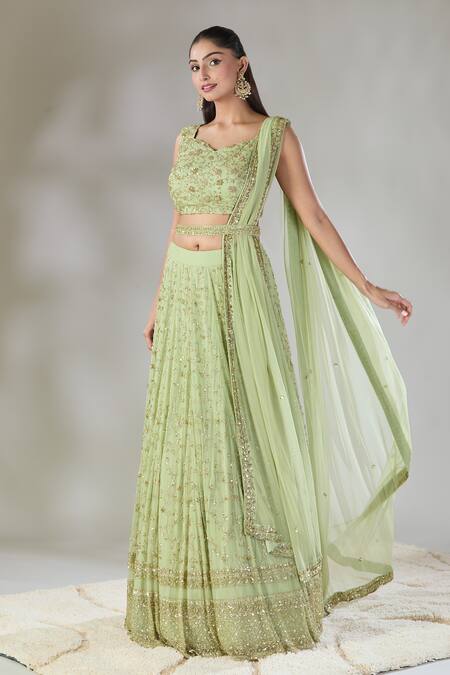 Astha Narang Green Net Cut Work, Sequins Sweetheart Neck Heavy Jaal Lehenga Set at Aza Fashions Astha Narang_Green Net Cut Work, Sequins Sweetheart Neck Heavy Jaal Lehenga Set _at_Aza_Fashions