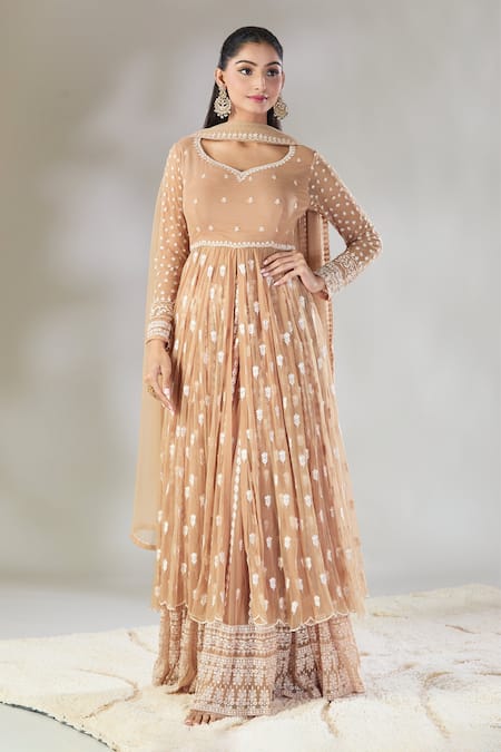 Astha Narang Beige Net Embroidered Floral Paan Neck Anarkali Sharara Set 