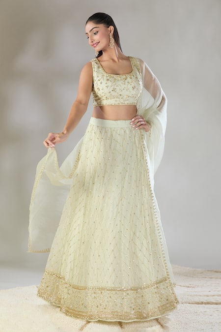 Shop Astha Narang Off White Net Sequins, Embroidery Round Neck Floral Jaal Lehenga Set Online at Aza Fashions Shop_Astha Narang_Off White Net Sequins, Embroidery Round Neck Floral Jaal Lehenga Set _Online_at_Aza_Fashions