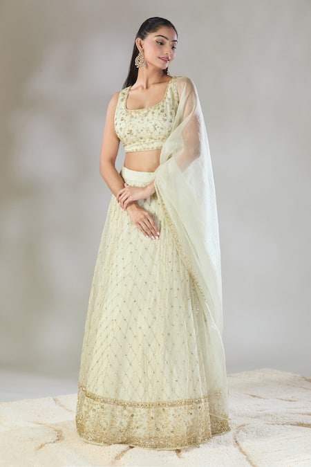 Astha Narang Off White Net Sequins, Embroidery Round Neck Floral Jaal Lehenga Set at Aza Fashions Astha Narang_Off White Net Sequins, Embroidery Round Neck Floral Jaal Lehenga Set _at_Aza_Fashions