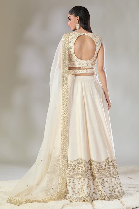 Shop Astha Narang Off White Silk Embroidery, Cut Work, Sequins Round Neck Raw Border Lehenga Set at Aza Fashions Shop_Astha Narang_Off White Silk Embroidery, Cut Work, Sequins Round Neck Raw Border Lehenga Set _at_Aza_Fashions