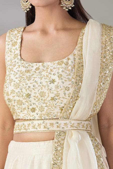 Buy Astha Narang Off White Silk Embroidery, Cut Work, Sequins Round Neck Raw Border Lehenga Set Online at Aza Fashions Buy_Astha Narang_Off White Silk Embroidery, Cut Work, Sequins Round Neck Raw Border Lehenga Set _Online_at_Aza_Fashions