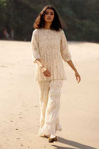 Shop_Dash And Dot_Off White Cotton Lace Round Neck All-over Ruched Top And Pant Co-ord Set _Online_at_Aza_Fashions