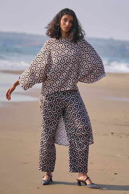 Dash And Dot Black Cotton Boat Neck High-low Hem Printed Top And Pant Co-ord Set Online at Aza Fashions Dash And Dot_Black Cotton Boat Neck High-low Hem Printed Top And Pant Co-ord Set _Online_at_Aza_Fashions