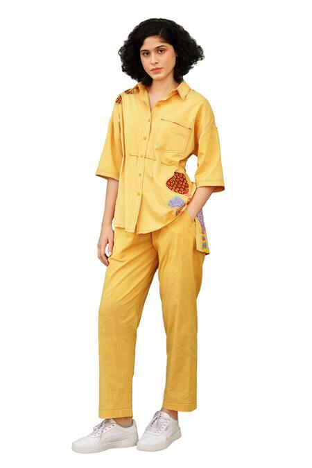 Shop Shilpi Gupta Yellow Cotton Satin Embellished Resham Sequin Asymmetric Shirt And Pant Set Online at Aza Fashions Shop_Shilpi Gupta_Yellow Cotton Satin Embellished Resham Sequin Asymmetric Shirt And Pant Set _Online_at_Aza_Fashions