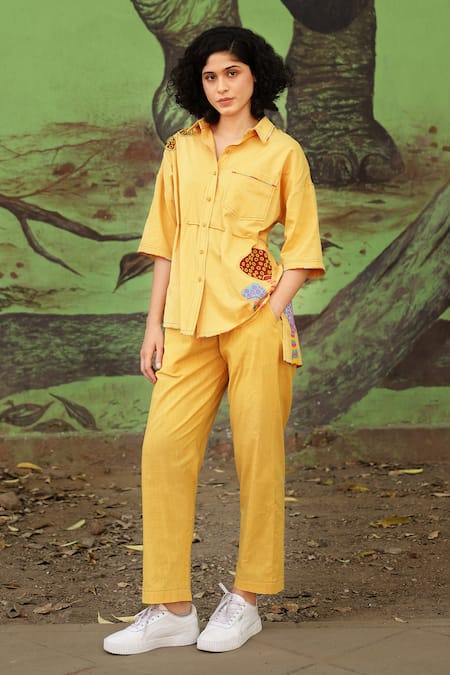 Shilpi Gupta_Yellow Cotton Satin Embellished Resham Sequin Asymmetric Shirt And Pant Set _at_Aza_Fashions