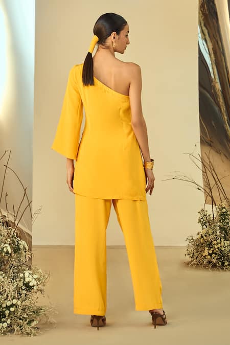 Shop Origani Yellow Crepe Applique One Shoulder Tunic With Pant at Aza Fashions Shop_Origani_Yellow Crepe Applique One Shoulder Tunic With Pant _at_Aza_Fashions
