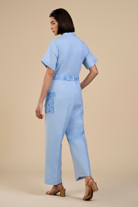 Shop Origani Blue Linen, Voile Embroidery Floral Cutwork Patch Pocket Jumpsuit With Belt at Aza Fashions Shop_Origani_Blue Linen, Voile Embroidery Floral Cutwork Patch Pocket Jumpsuit With Belt _at_Aza_Fashions