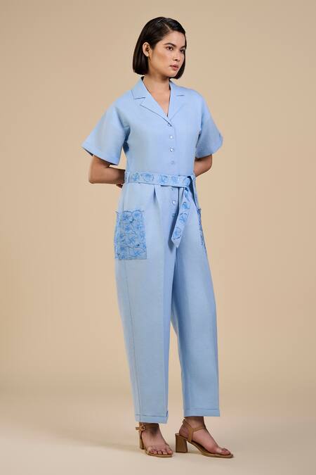 Origani Blue Linen, Voile Embroidery Floral Cutwork Patch Pocket Jumpsuit With Belt Online at Aza Fashions Origani_Blue Linen, Voile Embroidery Floral Cutwork Patch Pocket Jumpsuit With Belt _Online_at_Aza_Fashions