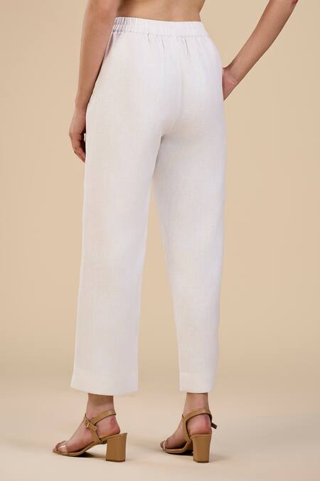 Shop Origani White 100% Linen Plain Petal Slit Pant at Aza Fashions Shop_Origani_White 100% Linen Plain Petal Slit Pant_at_Aza_Fashions