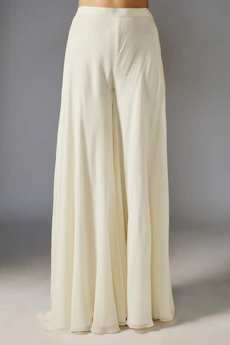 Buy Maisolos Ivory Ramie, Georgette Sequins, Floral Embellished Peplum Jacket With Sharara Online at Aza Fashions Buy_Maisolos_Ivory Ramie, Georgette Sequins, Floral Embellished Peplum Jacket With Sharara_Online_at_Aza_Fashions