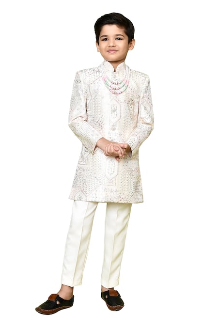 Shop Petite Pomme Beige Jacquard, Polyester, Terrycloth Sequins, Embroidery Sherwani And Trouser Set Online at Aza Fashions Shop_Petite Pomme_Beige Jacquard, Polyester, Terrycloth Sequins, Embroidery Sherwani And Trouser Set _Online_at_Aza_Fashions