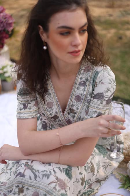 Summer By Priyanka Gupta_Ivory Georgette Embroidery V-neck Gardenia Printed Wrap-around Dress_Online_at_Aza_Fashions