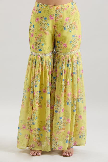 Buy Basanti - Kapde Aur Koffee X AZA Yellow Chiffon, Cotton Pearls, Beads Asymmetric Floral Print Cape And Sharara Set Buy_Basanti - Kapde Aur Koffee X AZA_Yellow Chiffon, Cotton Pearls, Beads Asymmetric Floral Print Cape And Sharara Set