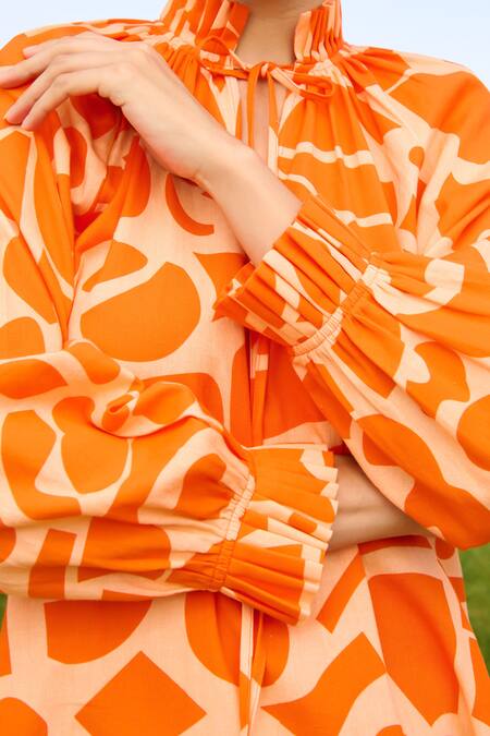 RAAS LIFE Orange Linen Cotton Print Daisy Pleated High Neck Midi Dress at Aza Fashions RAAS LIFE_Orange Linen Cotton Print Daisy Pleated High Neck Midi Dress _at_Aza_Fashions