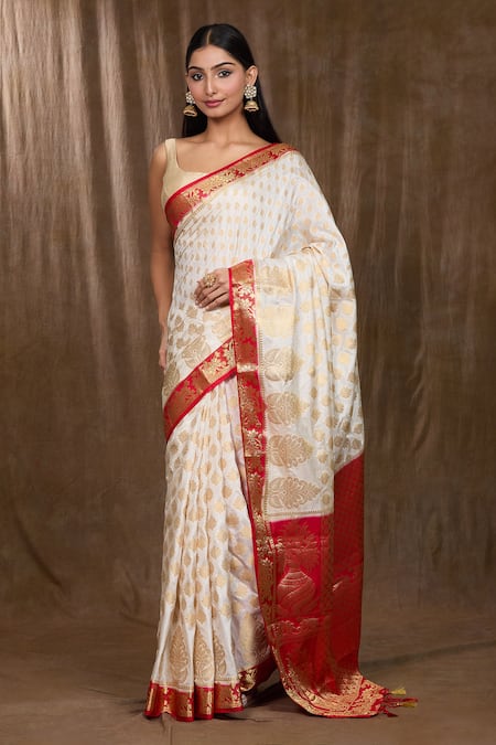 Buy Naintara Bajaj White Satin, Silk Zari, Floral And Woven Pattern Saree With Running Blouse Online at Aza Fashions Buy_Naintara Bajaj_White Satin, Silk Zari, Floral And Woven Pattern Saree With Running Blouse _Online_at_Aza_Fashions