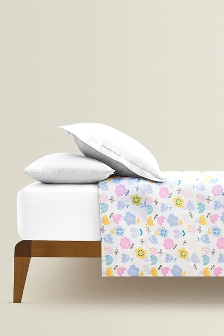 Shop The Baby Atelier Multi Color Organic Cotton Whimsical Flowers Print Junior Bed Cover at Aza Fashions Shop_The Baby Atelier_Multi Color Organic Cotton Whimsical Flowers Print Junior Bed Cover_at_Aza_Fashions