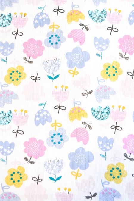 Buy The Baby Atelier Multi Color Organic Cotton Whimsical Flowers Print Junior Bed Cover Online at Aza Fashions Buy_The Baby Atelier_Multi Color Organic Cotton Whimsical Flowers Print Junior Bed Cover_Online_at_Aza_Fashions