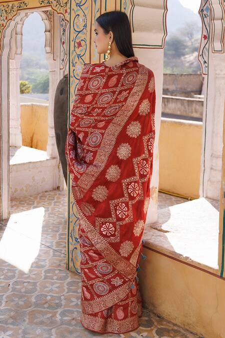 Shop Geroo Jaipur Red Modal, Silk Zari Ajrakh Print Gharchola Saree With Unstitched Blouse Piece at Aza Fashions Shop_Geroo Jaipur_Red Modal, Silk Zari Ajrakh Print Gharchola Saree With Unstitched Blouse Piece_at_Aza_Fashions