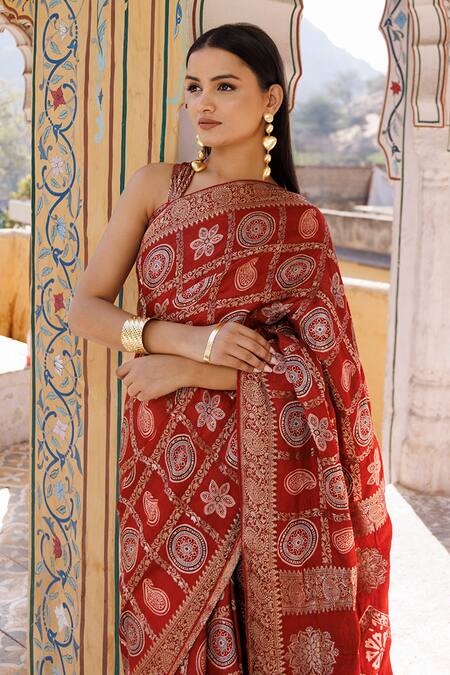 Geroo Jaipur Red Modal, Silk Zari Ajrakh Print Gharchola Saree With Unstitched Blouse Piece at Aza Fashions Geroo Jaipur_Red Modal, Silk Zari Ajrakh Print Gharchola Saree With Unstitched Blouse Piece_at_Aza_Fashions