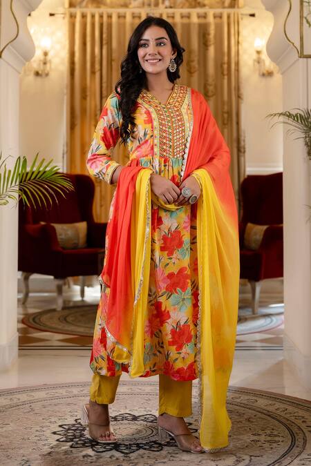 Kohsh Yellow Chiffon Embroidery, Mirrors V-neck Floral Pattern Yoke Kurta Pant Set at Aza Fashions Kohsh_Yellow Chiffon Embroidery, Mirrors V-neck Floral Pattern Yoke Kurta Pant Set_at_Aza_Fashions