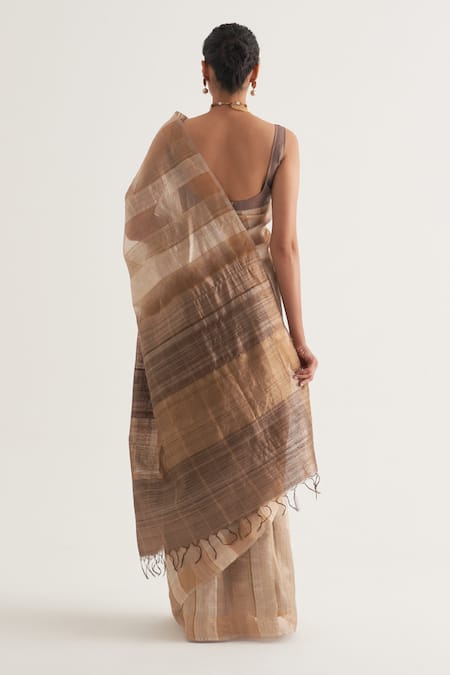 Shop Five Point Five Beige Tussar Chhavi Vertical Stripe Pattern Saree With Unstitched Blouse Piece at Aza Fashions Shop_Five Point Five_Beige Tussar Chhavi Vertical Stripe Pattern Saree With Unstitched Blouse Piece _at_Aza_Fashions