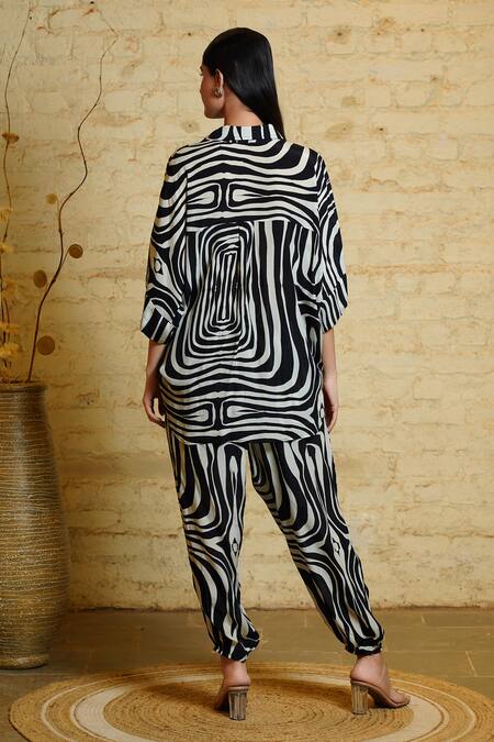 Shop Sajeda A Lehry Black Silk, Crepe Tassels, Metallic Thread Athena Stripe Print Tunic And Pant Set at Aza Fashions Shop_Sajeda A Lehry_Black Silk, Crepe Tassels, Metallic Thread Athena Stripe Print Tunic And Pant Set_at_Aza_Fashions