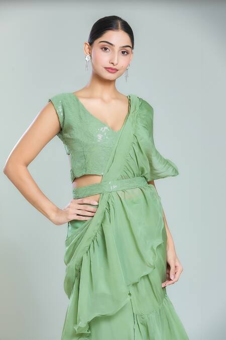 Naintara Bajaj_Green Organza, Georgette Sequins V-neck Solid Tiered Pre-draped Ruffle Saree Set_at_Aza_Fashions