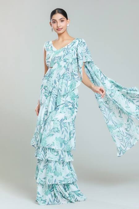Naintara Bajaj White Georgette V-neck Cloudburst Woods Print Tiered Pre-draped Ruffle Saree Set at Aza Fashions Naintara Bajaj_White Georgette V-neck Cloudburst Woods Print Tiered Pre-draped Ruffle Saree Set_at_Aza_Fashions